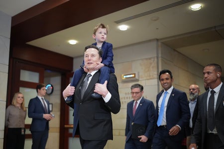 Elon Musk carries son X on shoulders at the U.S. Capitol