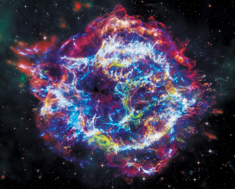 Cassiopeia in pinks, blues, greens and yellows captured by JWST and Hubble.