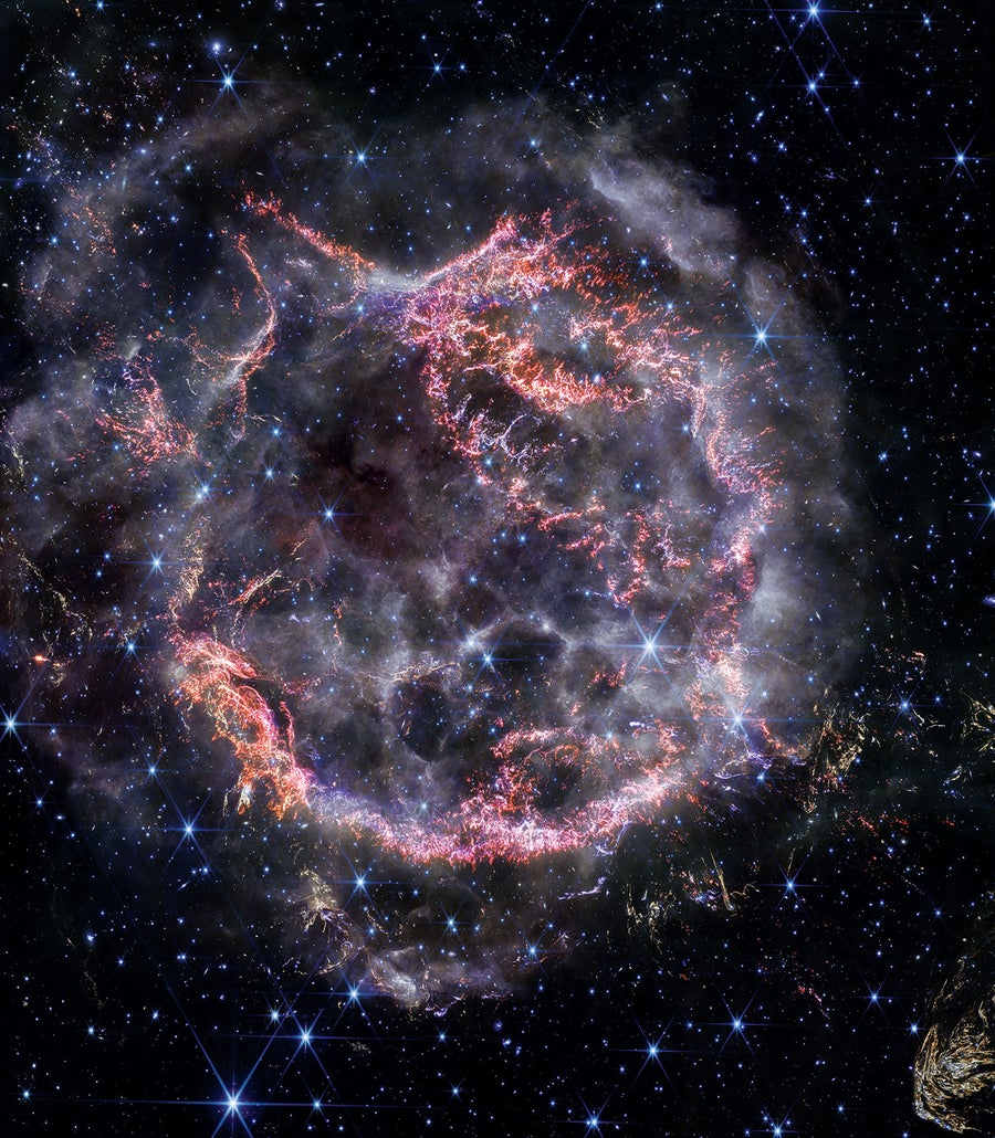 Cassiopeia A in pinks and purples captured by NIRCam.