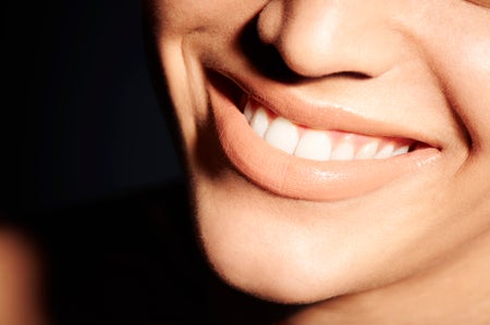 Close up of woman's smile.